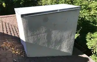 Rooftop chimney cap with metal covering Rooftop chimney cap with metal covering