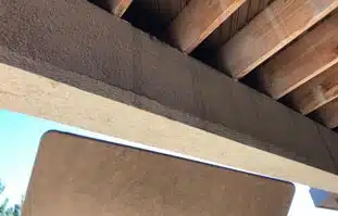 Room ceiling with natural wood beam detail Room ceiling with natural wood beam detail